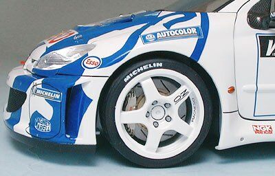 Сборная модель 1/24 автомобиля Peugeot 206 WRC Tamiya 24221